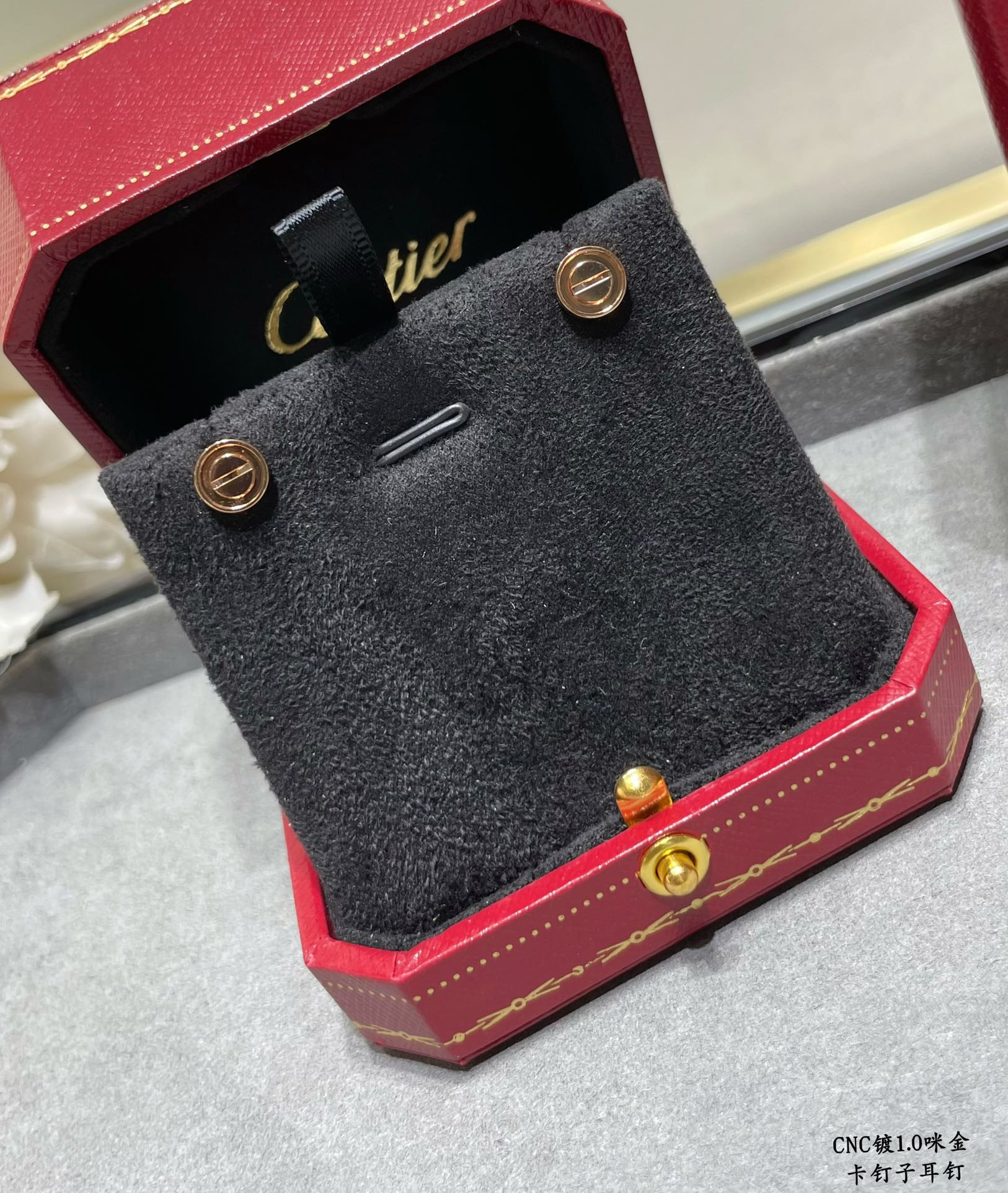 Cartier nail earrings