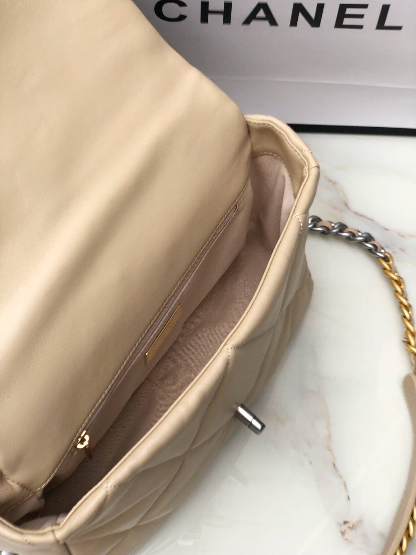 CHANEL 19 HANDBAG Shiny Leather, Gold-Tone, Silver-Tone & Ruthenium-Finish Metal Beige 30x20x10cm