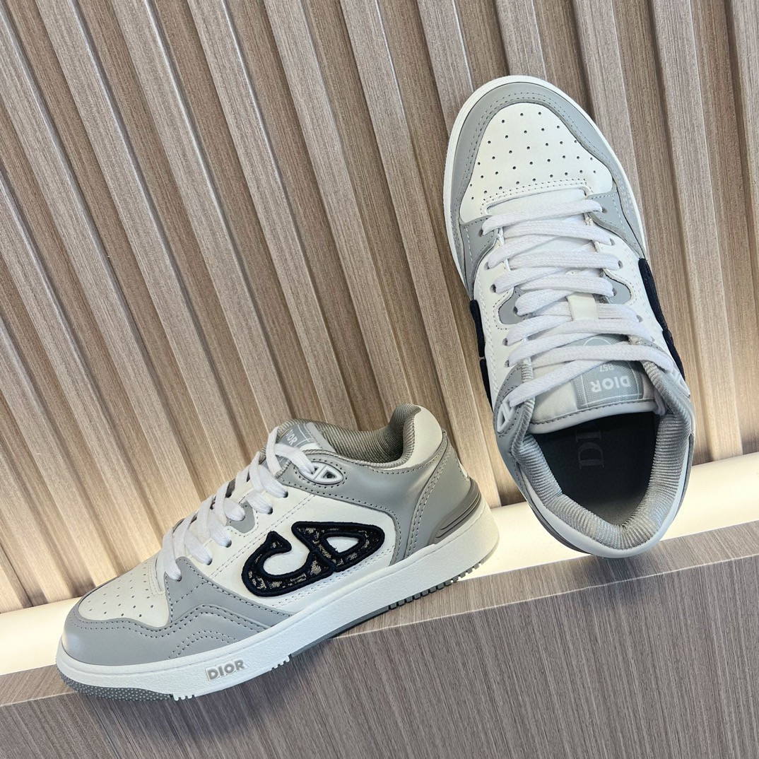 ua D*or b57 low-top sneaker  gray and white