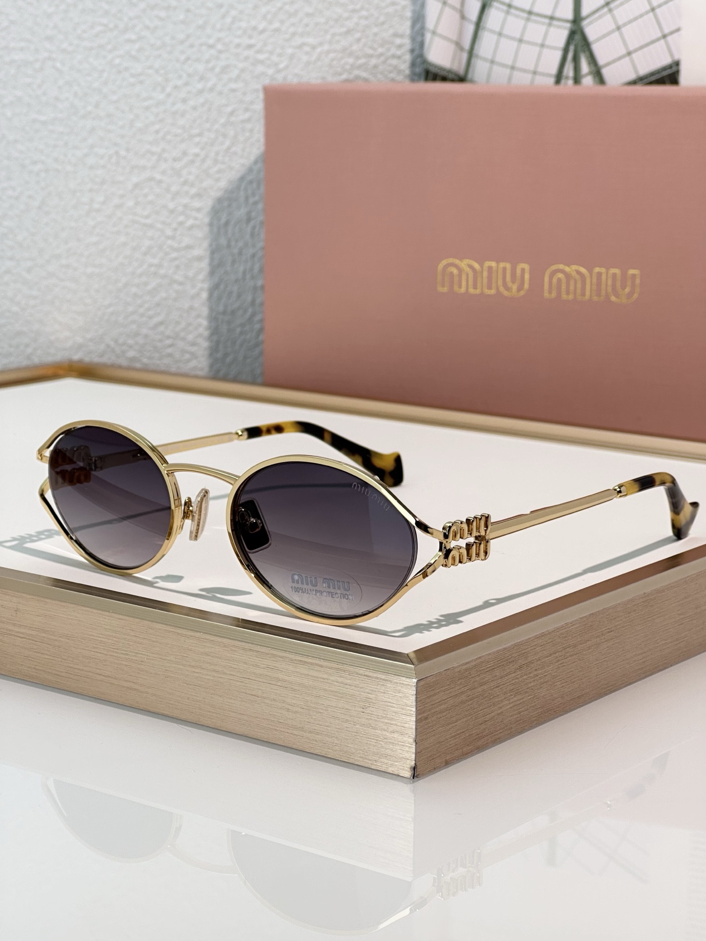 Miu Miu Glasses SMU52Y 54-21-125